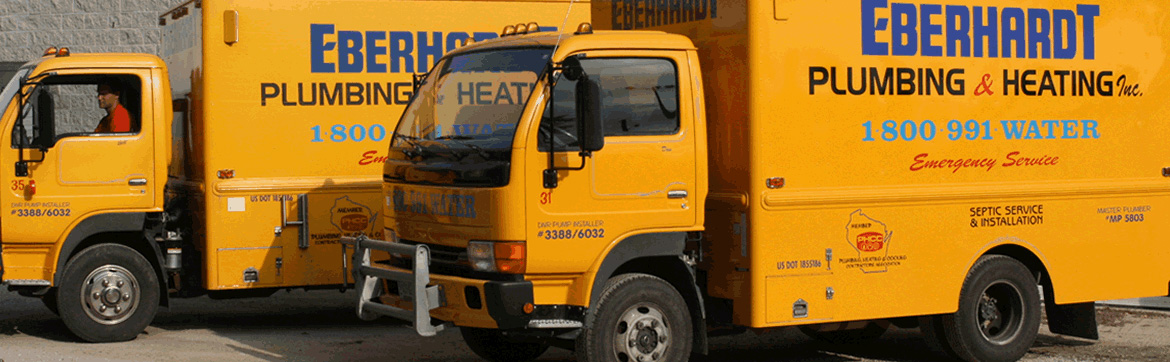 Eberhardt Plumbing & Heating yellow trucks